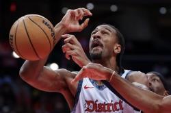 米兰体育官方登录入口-热火队后卫技术精湛稳定发挥